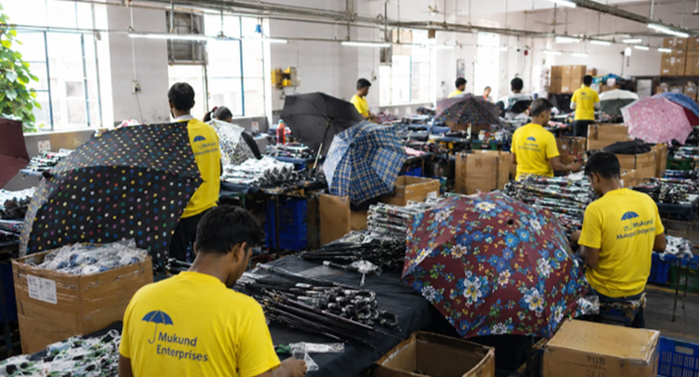 Team finishing and packing printed umbrellas
